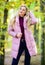 Jackets everyone should have. Girl fashionable blonde walk in park. Best puffer coats to buy. How to rock puffer jacket