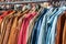 Jackets and shirts on vintage clothing market / second hand fashion flea market