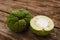 Jackfruit and a half on wood closeup