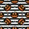 Jackolantern seamless pattern on striped background. Vector Halloween pumpkin with face illustration