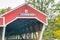 JACKSON, NH - OCTOBER 2015: Wooden covered bridge in Jackson, foliage season