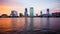 Jacksonville, Florida City Skyline at Sunset logos blurred