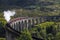 Jacobite steam train on Glenfinnan Viaduct at Loch Shiel, Mallaig, Highlands, Scotland