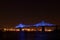 Jacques Cartier Bridge Illumination in Montreal, reflection in water. Montrealâ€™s 375th anniversary.