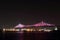 Jacques Cartier Bridge Illumination in Montreal, reflection in water. Montrealâ€™s 375th anniversary.