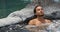Jacuzzi at resort Spa wellness - man relaxing in hot tub whirlpool pool