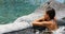 Jacuzzi at resort Spa wellness - woman relaxing in hot tub whirlpool pool