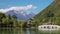 Jade Dragon Snow Mountain and the Suocui Bridge over the Black Dragon Pool in the Jade Spring Park, Lijiang, Yunnan province,