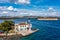 Jadrija lighthouse in Sibenik bay entrance aerial view, archipelago of Dalmatia, Croatia. Aerial view of lighthouse in town of