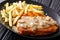 Jaeger schnitzel with sauce and garnish of french fries close-up on plate. horizontal