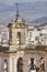 Jaen skyline with old chapel buildings and olive tree landscape