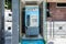 Jaen, Spain - June 18, 2020:  Public telephone kiosk along a town centre street. One of old and useless public phones that remains