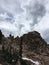 Jagged cliff in Little Cottowood Canyon Utah with dark gloomy skies