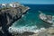 Jagged and dotted rocky coastline with amazing azure water of Tenerife Island