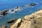 Jagged rocks jutting out of the Atlantic ocean near the Albufeira coastline