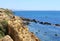 Jagged rocky cliffs overlooking the Atlantic Ocean