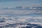 Jagged snowy High Tatra peaks above hazy Podhale basin Poland