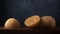 Jaggery, cup shaped unrefined sugar or palm sugar on dark background