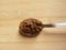 Jaggery granules on spoon