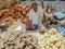 Jaggery seller selling jaggery in a village fair in India