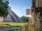 Jaguar head and Mayan Temple pyramid of Kukulkan - Chichen Itza, Mexico