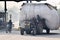 Jaipur, India - December 30, 2014: Indian man driving Heavily overloaded truck in Jaipur