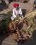 JAIPUR, INDIA - MARCH 20, 2019: an indian man sells dung fuel in jaipur