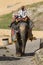 JAIPUR, INDIA - SEPTEMBER 18, 2017: Unidentified men ride decorated elephants in Jaleb Chowk in Amber Fort in Jaipur, India.