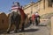 JAIPUR, INDIA - SEPTEMBER 18, 2017: Unidentified men ride decorated elephants in Jaleb Chowk in Amber Fort in Jaipur, India.