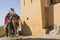 JAIPUR, INDIA - SEPTEMBER 18, 2017: Unidentified men ride decorated elephants in Jaleb Chowk in Amber Fort in Jaipur, India.