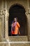 JAISALMER, RAJASTHAN, INDIA, November 2018, Tourist inside the heavily carved window of Kothari`s Patwon ki Haveli