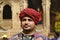 JAISALMER, RAJASTHAN, INDIA, November 2018, Tourist in traditional Rajasthani turban and costume near Kothari`s Patwon ki Haveli