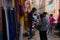 Jaisalmer, Rajasthan, India - October 13, 2019 : Colourful ladies clothes are being sold to female foreigners in market place