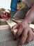 Jakarta, Indonesia - December 13th 2020: carpenter is drilling wood
