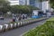 Jakarta, Indonesia - June 30 2022: Jakarta early morning traffic at Sudirman street with Motorcycles, cars and TransJakarta Bus