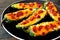 Jalapeno poppers with cheese and pepperoni close up