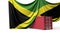 Jamaica flag draped over a commercial trade shipping container. 3D Rendering