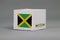 Jamaica flag on white box with barcode and the color of nation flag. The concept of export trading from Jamaica