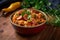 Jambalaya with Andouille Sausage, Shrimp, and Vegetables in a Colorful Ceramic Dish