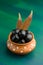 Jambolan plum or jambul or Jamun fruit, Java plum Syzygium cumini on textured background