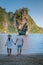 James bond Island Phangnga Bay Thailand, couple visit the Island, traveler on tropical sea beach near Phuket, Travel