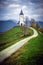 Jamnik, Slovenia - The beautiful church of St. Primoz in Slovenia near Jamnik with Julian Alps