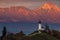 Jamnik, Slovenia - Beautiful golden sunset at Jamnik St. Primoz church with Julian Alps at background