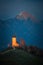 Jamnik, Slovenia - Beautiful illuminated St. Primoz hilltop church with Julian Alps at background