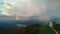 Jamnik, Slovenia - Panoramic view of rainbow over the church of St. Primoz