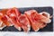 Jamon serrano. Traditional Spanish ham, Slicing of dry-cured ham in Spain