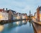 Jan van Eyck Square over the waters of Spiegelrei, Bruges