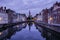 Jan van Eyckplein, old town of Bruges, Belgium during sunset.