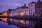 Jan van Eyckplein, old town of Bruges, Belgium during sunset.