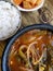 Janggukbap is a rice in beef soup with served with sticky rice and kimchi